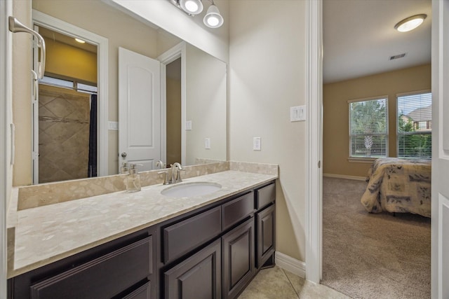 17310 Venado Dr, Cypress, TX 77433 - ensuite bathroom with vanity and baseboards