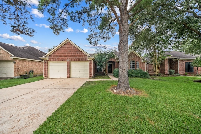 30927 N Head Dr, Spring, TX 77386 - view of front of property with a garage, brick siding, concrete driveway, and a front yard