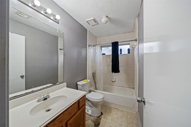 30927 N Head Dr, Spring, TX 77386 - bathroom featuring vanity, shower / tub combo with curtain, and a textured ceiling