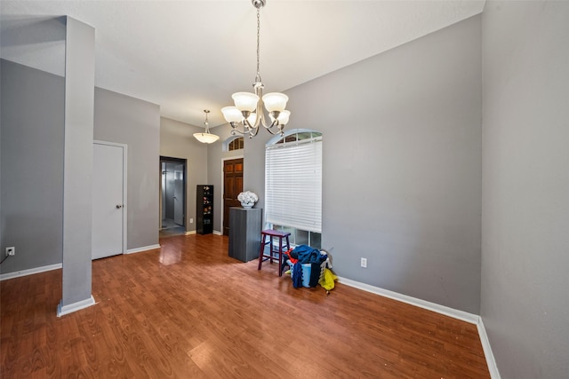 30927 N Head Dr, Spring, TX 77386 - unfurnished dining area with a chandelier and wood finished floors