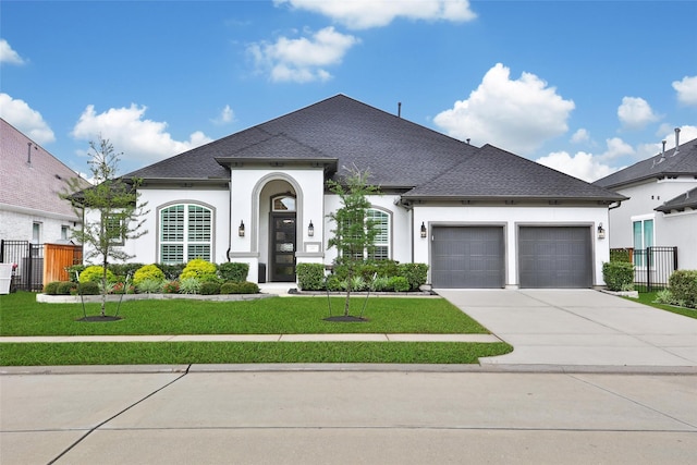 5350 Cherry Spring Dr, Spring, TX 77386 - french provincial home with stucco siding, an attached garage, concrete driveway, and a shingled roof