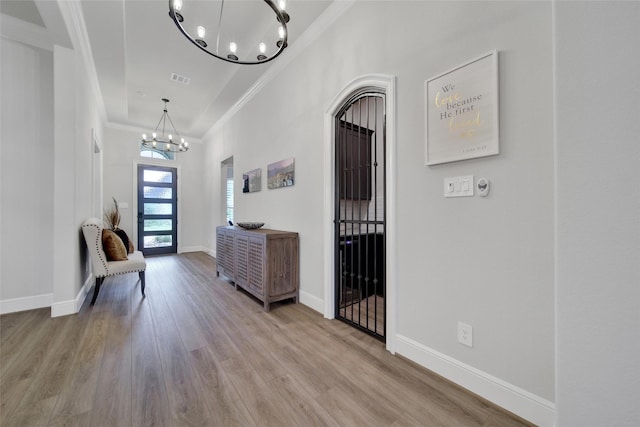 5350 Cherry Spring Dr, Spring, TX 77386 - entryway featuring a chandelier, crown molding, and wood finished floors