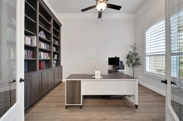 5350 Cherry Spring Dr, Spring, TX 77386 - home office featuring a ceiling fan, crown molding, french doors, and light wood-type flooring