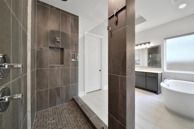 5350 Cherry Spring Dr, Spring, TX 77386 - bathroom with tile patterned flooring, a tile shower, vanity, a bidet, and recessed lighting