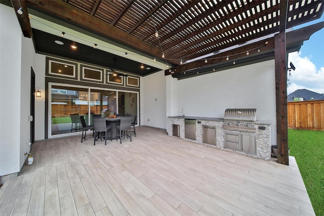 5350 Cherry Spring Dr, Spring, TX 77386 - view of patio with exterior kitchen, a pergola, a wooden deck, and outdoor dining area