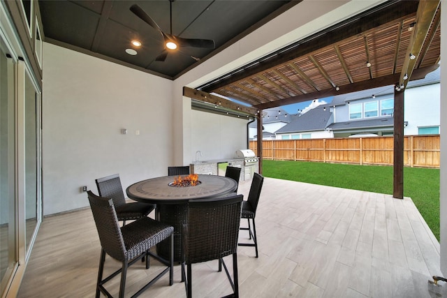 5350 Cherry Spring Dr, Spring, TX 77386 - fenced backyard with area for grilling, outdoor dining area, and a patio area