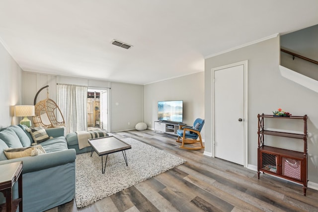 10676 Hazelhurst Dr, Houston, TX 77043 - living area featuring wood finished floors and crown molding
