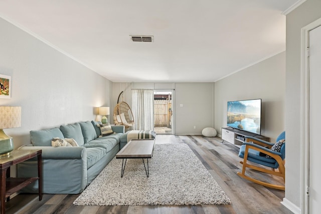 10676 Hazelhurst Dr, Houston, TX 77043 - living room featuring ornamental molding and wood finished floors