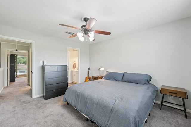 10676 Hazelhurst Dr, Houston, TX 77043 - bedroom with carpet, ceiling fan, and attic access