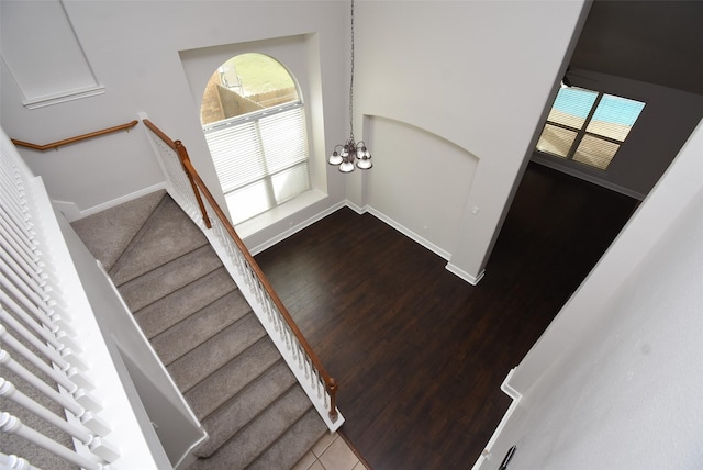 2611 Sandy Mist Ct, Katy, TX 77494 - stairs with wood finished floors and baseboards