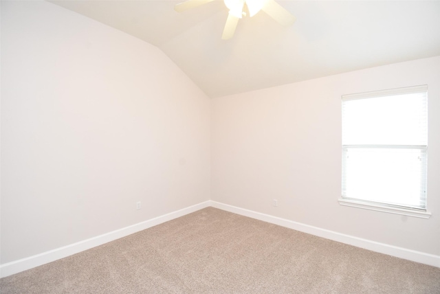 2611 Sandy Mist Ct, Katy, TX 77494 - unfurnished room with light colored carpet, vaulted ceiling, and a ceiling fan