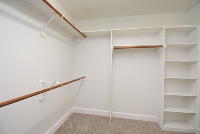 2611 Sandy Mist Ct, Katy, TX 77494 - walk in closet featuring carpet
