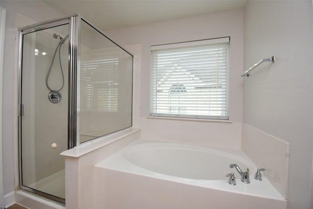 2611 Sandy Mist Ct, Katy, TX 77494 - bathroom featuring a shower stall and a garden tub