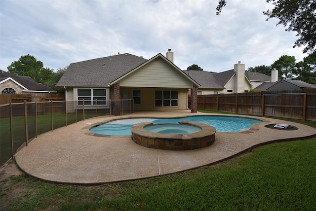 2611 Sandy Mist Ct, Katy, TX 77494 - view of pool with a patio, a fenced backyard, and a pool with connected hot tub