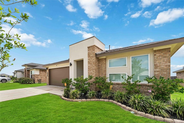 7902 Sleek Flock Ln, Rosharon, TX 77583 - view of front of property with an attached garage, driveway, a front yard, brick siding, and stucco siding