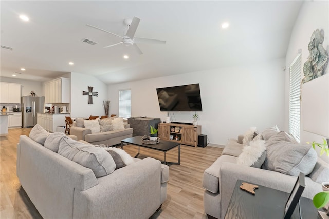7902 Sleek Flock Ln, Rosharon, TX 77583 - living room featuring recessed lighting, ceiling fan, light wood-style floors, and vaulted ceiling