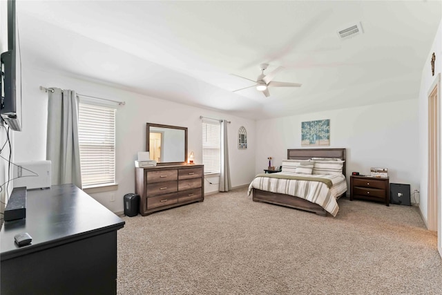 7902 Sleek Flock Ln, Rosharon, TX 77583 - carpeted bedroom with multiple windows and a ceiling fan