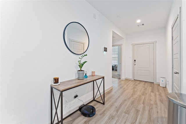 7902 Sleek Flock Ln, Rosharon, TX 77583 - foyer with light wood-style floors and baseboards