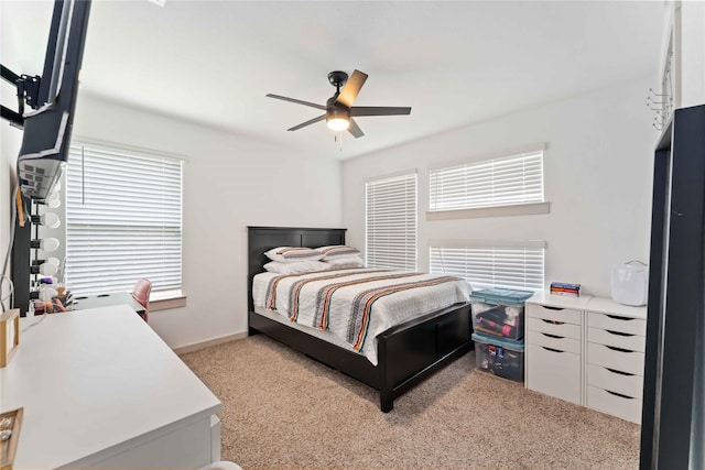 7902 Sleek Flock Ln, Rosharon, TX 77583 - bedroom featuring light colored carpet and a ceiling fan