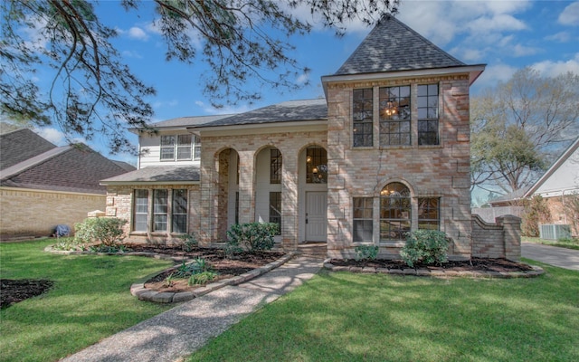 1511 Calveryman Ln, Katy, TX 77449 - view of front of property with brick siding, a front lawn, and roof with shingles