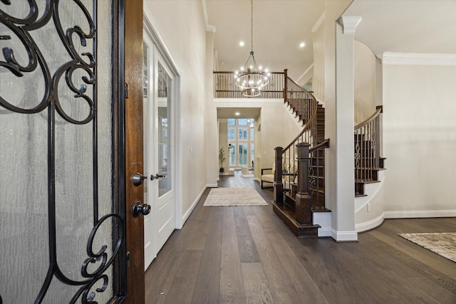 1923 Rice Mill Dr, Katy, TX 77493 - foyer featuring crown molding, stairs, a chandelier, hardwood / wood-style flooring, and french doors