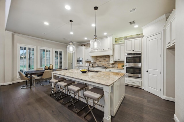 1923 Rice Mill Dr, Katy, TX 77493 - kitchen with appliances with stainless steel finishes, crown molding, backsplash, dark wood-style floors, and recessed lighting