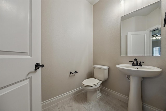 1923 Rice Mill Dr, Katy, TX 77493 - half bath with toilet and baseboards