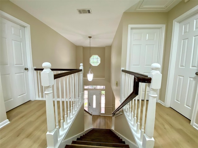 3210 Echo Mountain Dr, Houston, TX 77345 - stairs with wood finished floors