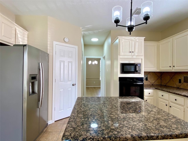 3210 Echo Mountain Dr, Houston, TX 77345 - kitchen featuring black appliances, a chandelier, white cabinetry, tasteful backsplash, and a center island