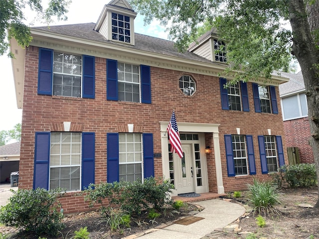 3210 Echo Mountain Dr, Houston, TX 77345 - view of front of house featuring brick siding and a shingled roof