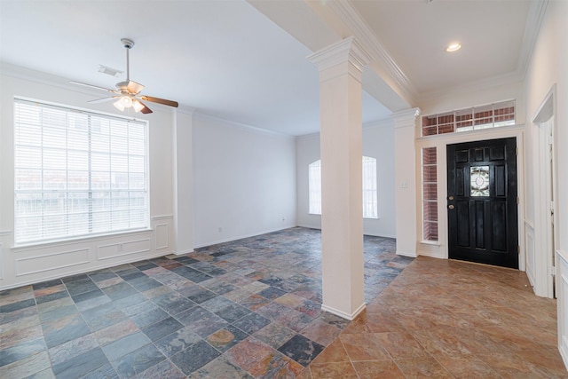 7314 Mountain Valley Dr, Houston, TX 77095 - foyer featuring a ceiling fan, stone tile flooring, ornamental molding, decorative columns, and a decorative wall