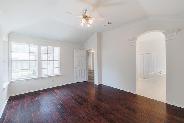 7314 Mountain Valley Dr, Houston, TX 77095 - spare room featuring arched walkways, decorative columns, a ceiling fan, wood-type flooring, and vaulted ceiling