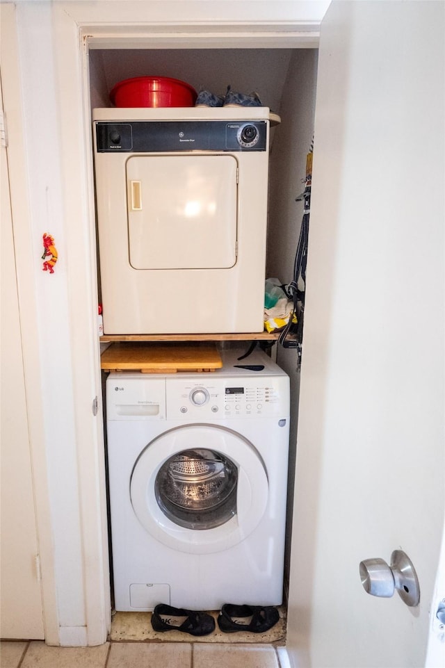 2110 Wilcrest Dr Unit 101, Houston, TX 77042 - washroom with estacked washer and dryer