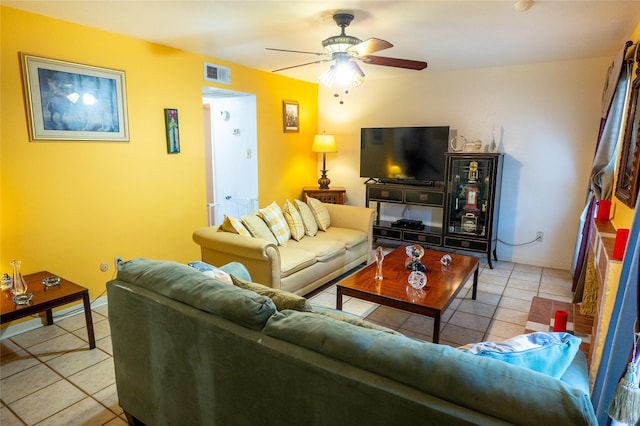 2110 Wilcrest Dr Unit 101, Houston, TX 77042 - living room with light tile patterned floors and a ceiling fan