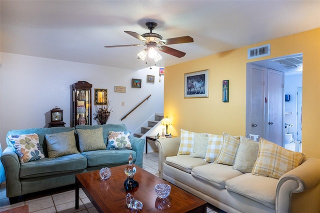 2110 Wilcrest Dr Unit 101, Houston, TX 77042 - living area featuring stairway, light tile patterned floors, and a ceiling fan