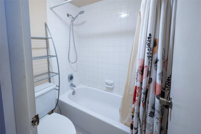 2110 Wilcrest Dr Unit 101, Houston, TX 77042 - bathroom featuring shower / bath combination with curtain and toilet