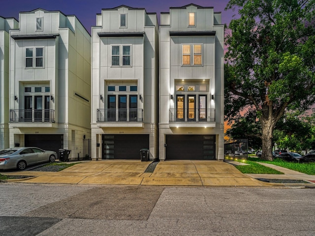 2221 Francis St, Houston, TX 77004 - view of front of home featuring an attached garage and driveway
