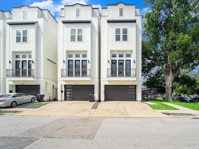 2221 Francis St, Houston, TX 77004 - view of front facade with an attached garage and driveway