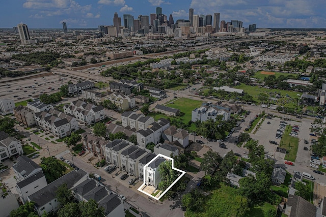 2221 Francis St, Houston, TX 77004 - aerial view of property and surrounding area featuring property boundaries highlighted and city skyline