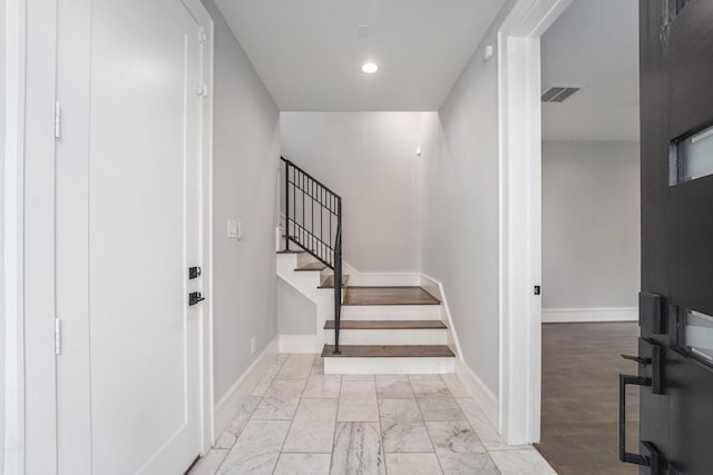 2221 Francis St, Houston, TX 77004 - foyer entrance featuring stairs, marble finish flooring, and recessed lighting