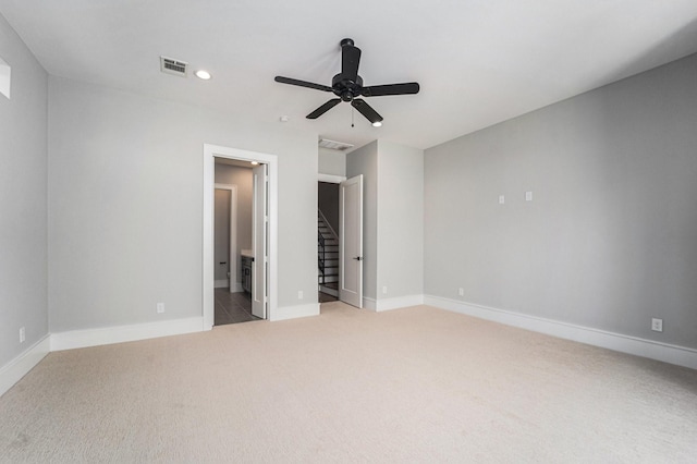 2221 Francis St, Houston, TX 77004 - unfurnished bedroom featuring light colored carpet, recessed lighting, ensuite bathroom, and a ceiling fan