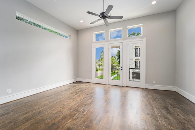 2221 Francis St, Houston, TX 77004 - empty room with wood finished floors, ceiling fan, and recessed lighting