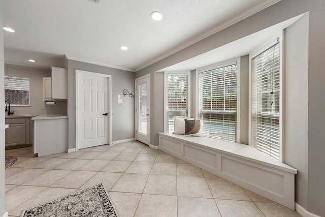 19 Shinyrock Pl, The Woodlands, TX 77381 - entrance foyer featuring ornamental molding, light tile patterned floors, and recessed lighting