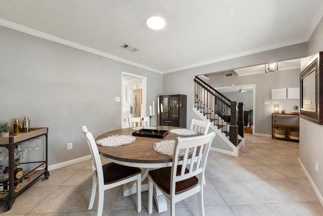 19 Shinyrock Pl, The Woodlands, TX 77381 - dining area featuring stairs, light tile patterned floors, crown molding, and a ceiling fan