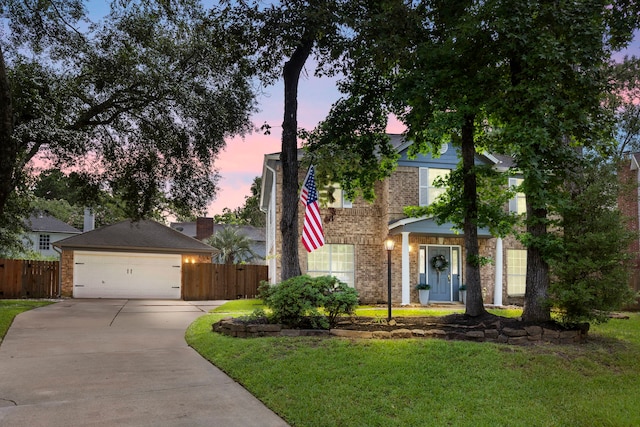 19 Shinyrock Pl, The Woodlands, TX 77381 - obstructed view of property featuring brick siding, a garage, and concrete driveway