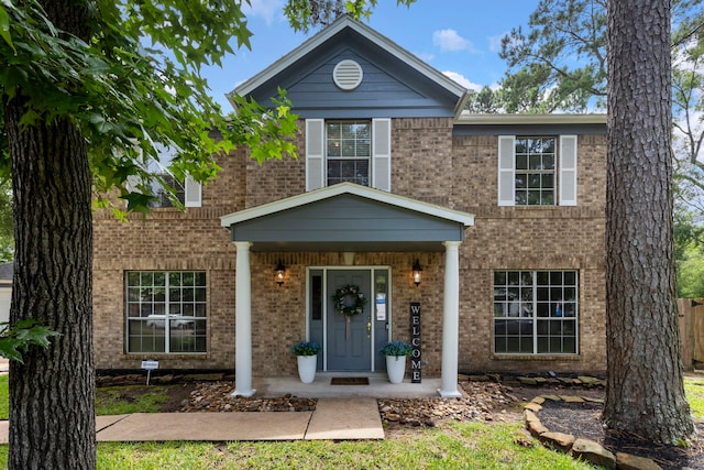 19 Shinyrock Pl, The Woodlands, TX 77381 - view of front of house featuring brick siding