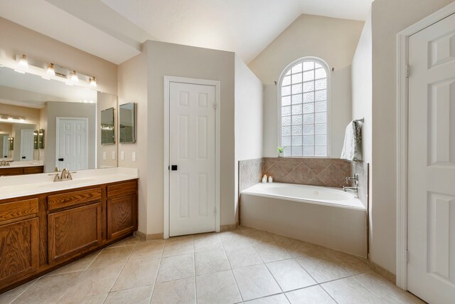 19 Shinyrock Pl, The Woodlands, TX 77381 - full bath featuring vanity, a garden tub, tile patterned floors, and lofted ceiling