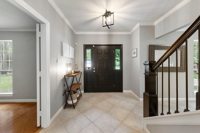 19 Shinyrock Pl, The Woodlands, TX 77381 - entryway featuring stairs, plenty of natural light, and crown molding