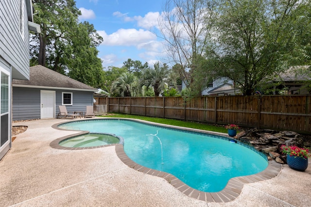 19 Shinyrock Pl, The Woodlands, TX 77381 - view of swimming pool with a fenced backyard, a patio area, and a pool with connected hot tub