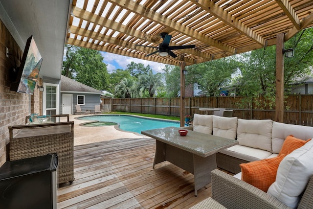 19 Shinyrock Pl, The Woodlands, TX 77381 - view of pool with a fenced backyard, a wooden deck, an outdoor hangout area, and a pergola